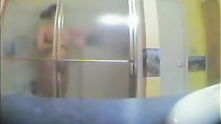 A girl did not know that there was a camera in the bathroom
