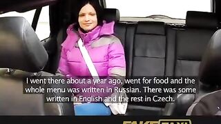 A hot girl is having fun with her taxi driver in the car