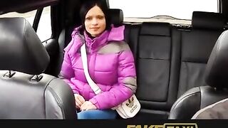 A hot girl is having fun with her taxi driver in the car