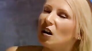 A beautiful woman is tied up and fucked by two guys
