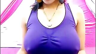 The nipples on her tits are standing out due to her excitement