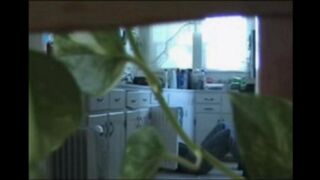 A married couple has fun on the naked walk around their house