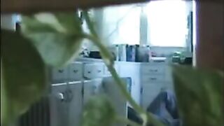 A married couple has fun on the naked walk around their house