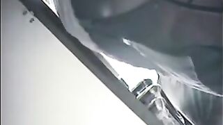 The hidden camera at the checkout captures steamy scenes under the skirt