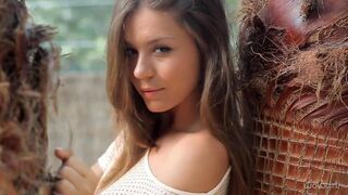 A young Russian girl is stripping erotically
