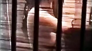 A guy licks the lips of a hairy pussy with his tongue