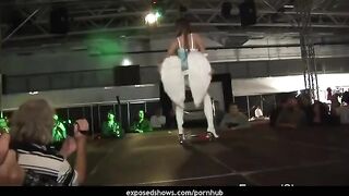 Hot brunette learns to work with a stripper pole