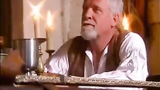 A beautiful woman is having sex with her lover in medieval clothes