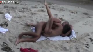 Real hidden shooting on the beach with a sexy teen