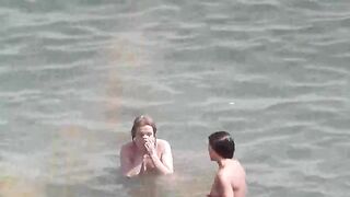 Bunch of sexy girls got naked to swim in the sea