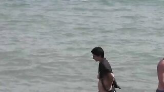 Bunch of sexy girls got naked to swim in the sea