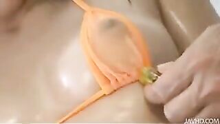 A whale in a bikini is gently prepared for sex, showcasing bondage and Asian flair
