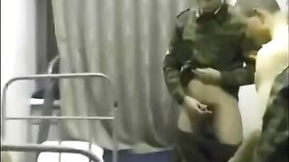 Barracks. A pretty chick is getting fucked by soldiers in the crowd