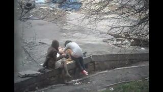 The guy shoots sex with a girl straight on the street