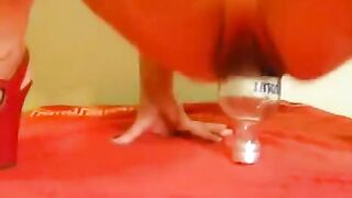 Fisting with a large dildo and a bottle, just for fun