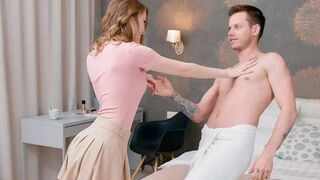 A couple has a cozy conversation while lying naked on the bed
