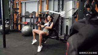 The girl is having fun with her friend in the gym, playing around