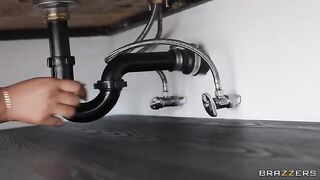 A juicy ass is being fucked by a black plumber in an interracial scene