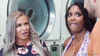 A hot chick is doing laundry and a guy comes to visit her