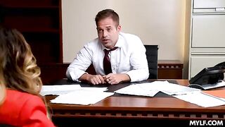 A busty MILF is being fucked in the office