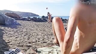 Two girls got caught wanking on a nude beach