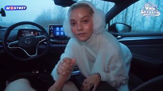 A pretty girl met a guy and sucked his dick in the car passionately