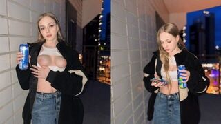 The cute girl showed more than just her tits for the energy drink