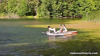A couple of cute girls are fucking on the city bench in this hot video