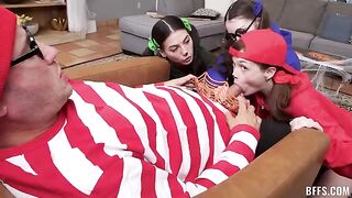 The guy is having a great time with four beautiful girls on the couch