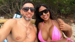 A girl is having fun on the beach and meets someone special