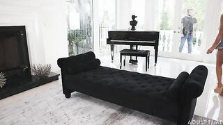 The man plows the girl in a passionate pose on the couch