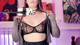 A girl caressed herself with a mirror, anticipating intense pleasure