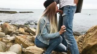 A blonde with sexy eyes has sex on the beach with a skilled man